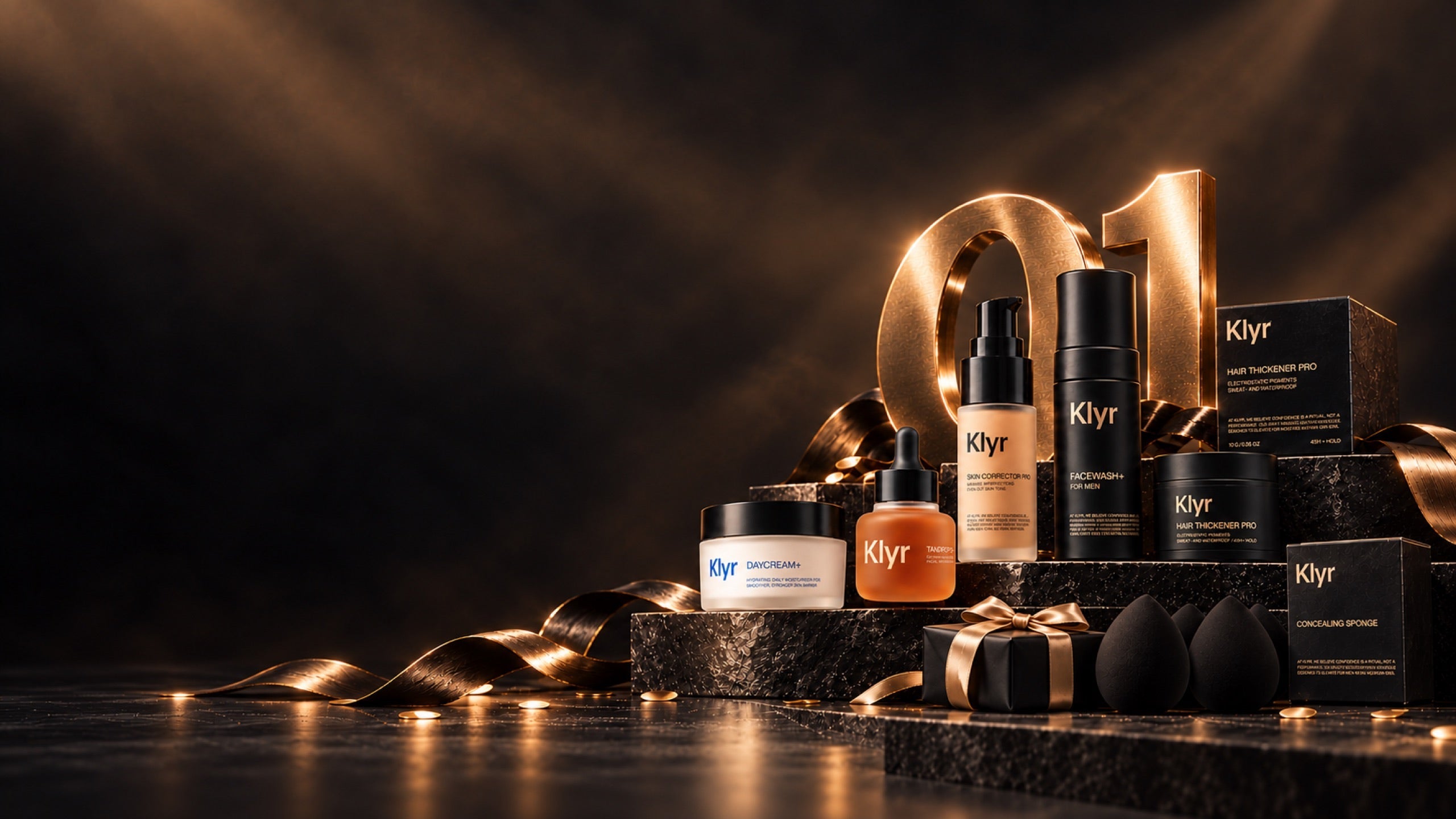 The Klyr product collection with a gold 01 and a birthday gift
